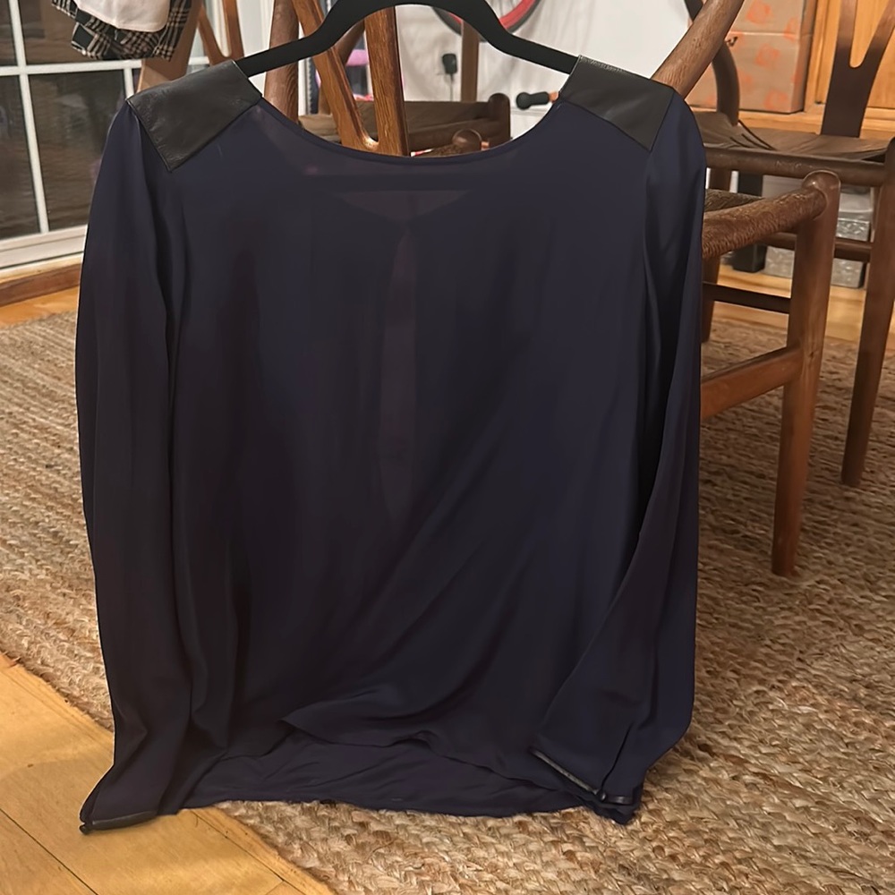 Club Monaco navy and black blouse, with beautiful open back. Leather shoulders